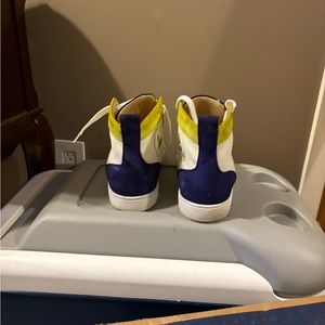 Christian louboutins sneakers descent condition a bit of fading on the green
